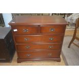 A 19thc style mahogany chest of drawers, the rectangular top with moulded edge, two short over three