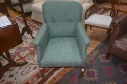 19th/20thc upholstered armchair on square tapered legs and brass castors