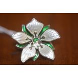 An enamel and white metal lily pad brooch by David Anderson of Norway, marks to rear (sterling)