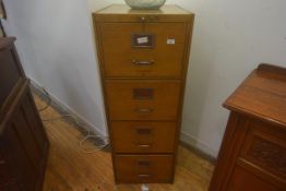 A vintage metal filing cabinet in an oak paint effect grain finish, 133cm x 49cm x 63cm