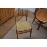 A set of four 'Cumbrae' teak dining chairs by Morris of Glasgow, with upholstered seats