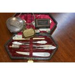 A sewing kit with mother of pearl handled tools in fitted case, a mesh coin purse and papier mache