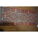 A Chobi kilim rug, 150cm x 60cm