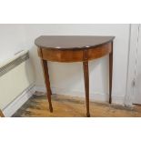 An Edwardian mahogany demi lune side table, the top with moulded edge and inlaid frieze on inlaid sq