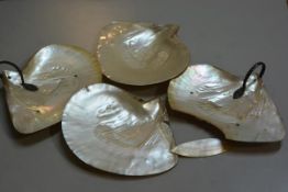 A set of four fan shells, two with white metal mounted handles (one a/f), approximate L 25cm each sh