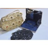 A 1950s beaded evening bag, a silk gold and silver thread evening bag and a 1930s chrome mounted lad