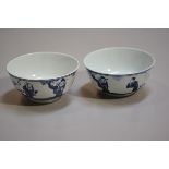 A pair of Chinese Republic porcelain underglazed blue and white bowls depicting Immortals (h. 5.5cm