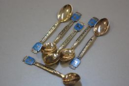 A set of six Norwegian 925 sterling silver enamelled crested coffee spoons decorated with cast word,