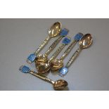 A set of six Norwegian 925 sterling silver enamelled crested coffee spoons decorated with cast word,