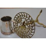 A 19thc Sheffield plated tankard with S scroll handle to side and a brass trivet mounted with horse