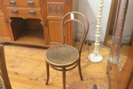 A Thonet of WLEN bentwood hoop back chair with original paper label verso (h. 84cm), £20-40