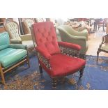 A 19thc mahogany scroll back drawing room easy chair with upholstered button back, arms and seat, in