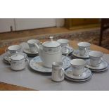A Noritake Bluehill pattern china twenty two piece teaset including teapot, sugar, cream etc., £20-4