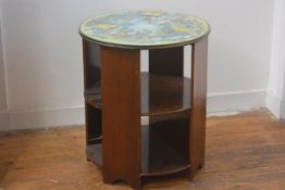 A 1930s walnut circular three tier drum style slatted side bookcase with jigsaw Aladdin top and plat