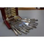 A set of eight Carrington, 130 Regent Street, London, stainless steel bladed Sheffield silver handle