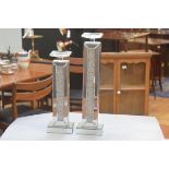 Two mirrored crystal and bead inset panelled candlesticks with glass tops (tallest h. 53cm), £20-40