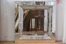 A modern square panelled and frosted crystal and silvered panel wall mirror (91cm x 90cm), £60-80