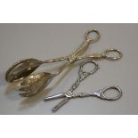 A pair of silver plated serving spoons and a pair of Danish white metal grape scissors (2), £10-20