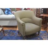 An Edwardian drawing room tub chair upholstered in green and gold check tweed fabric, with button ba