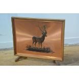 A 1950s South African embossed and appliqued plaque by D Thomson of a gazelle by H.T. Enterprises of