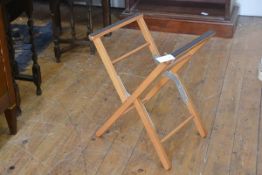 An ash folding luggage rack (h. 55cm x d. 43cm), £20-30