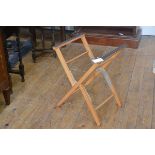 An ash folding luggage rack (h. 55cm x d. 43cm), £20-30