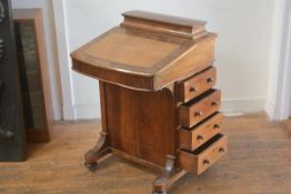 A Victorian figured walnut davenport inlaid desk, with lift up box top and slope front, enclosing a
