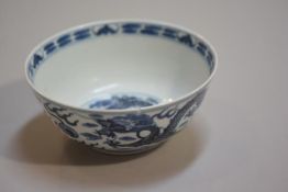 A 19thc Chinese dragon decorated bowl, four character seal mark verso (h. 6cm d.14.5cm), small chip