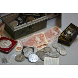 A money box containing a collection of Churchill Queen Elizabeth II crowns, Victorian and Georgian c