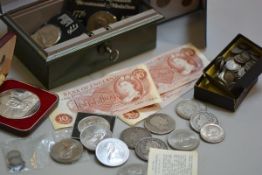 A money box containing a collection of Churchill Queen Elizabeth II crowns, Victorian and Georgian c