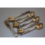 A set of six Norwegian 830 standard pierced heart design coffee spoons and similar matching pair of