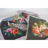 A needlework and beaded tapestry pheasant cushion cover, two grospoint floral cushion covers and a p