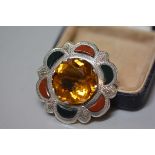 A Scottish sterling silver citrine and hardstone mounted plaid brooch (the circular citrine d. 2.5cm