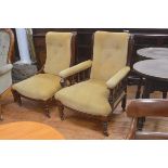 A Edwardian pair of lady's and gentleman's drawing room scroll back walnut framed easy chairs with b