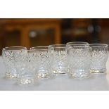 A set of seven Edinburgh Crystal miniature whisky tumblers with slice cut decoration (h.7cm), £30-40