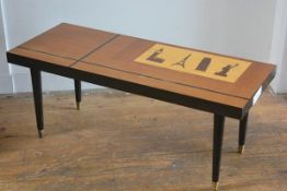 A 1950s/60s teak rectangular coffee table with ebonised, satinwood and mahogany inlay forming decora