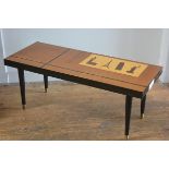 A 1950s/60s teak rectangular coffee table with ebonised, satinwood and mahogany inlay forming decora