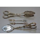 A pair of Norwegian 830 standard pastry lifts and another pair, with chased handles, and a pair of N