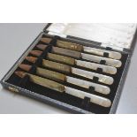 A set of six Sheffield silver bladed mother of pearl handled fruit knives, complete with original fi