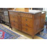 A cherrywood and mahogany Colonial style chest, the rectangular top with moulded edge and crossbande