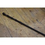 An African carved ebonised walking stick with pommel handle (l. 100cm), £20-40