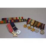 A collection of WWII and later miniature medals and bars including Air Crew Europe WWII General Serv