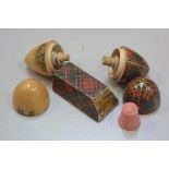 A 19thc mauchline ware McPherson tartan thimble case complete with spool and pink bakelite thimble,