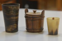 A 19thc walnut miniature butter tub with lug handles to side and two horn beakers (tallest 9.6cm), £