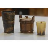 A 19thc walnut miniature butter tub with lug handles to side and two horn beakers (tallest 9.6cm), £