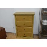 A stained pine shoe cupboard, the rectangular top with moulded edge above two double fronted drawers