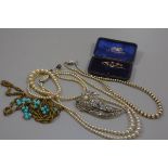 Three various paste pearl necklaces, a gilt metal chain necklace, a marcasite set brooch, a yellow m