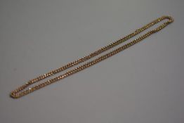 An Edwardian 9ct gold curb link guard chain (63cm), stamped 9ct (24.31g), £250-350