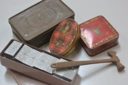 A Callard & Bowser thistle decorated tin, a Crawfords oval tartan shortbread tin, a Stag's head tin,