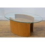 A burr oak eliptical framed glass topped coffee table with undertier (h. 39cm x l. 90cm x 54cm)